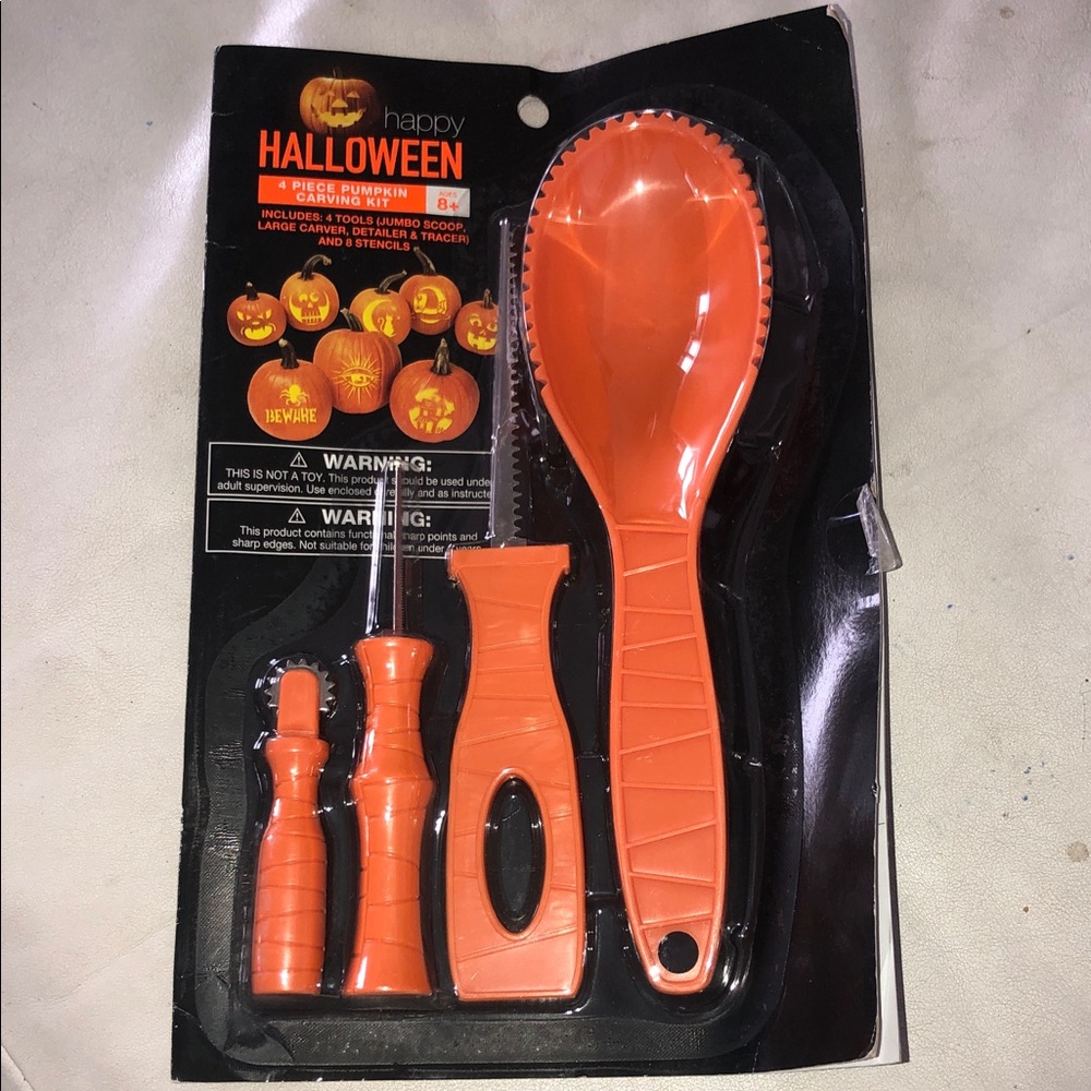 NEW FOUR PIECE PUMPKIN CARVING KIT WITH EIGHT STENCILS
